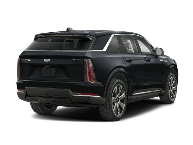 Black 2026 Cadillac Escalade IQ SUV seen from the rear, showcasing a sleek design and large wheels.